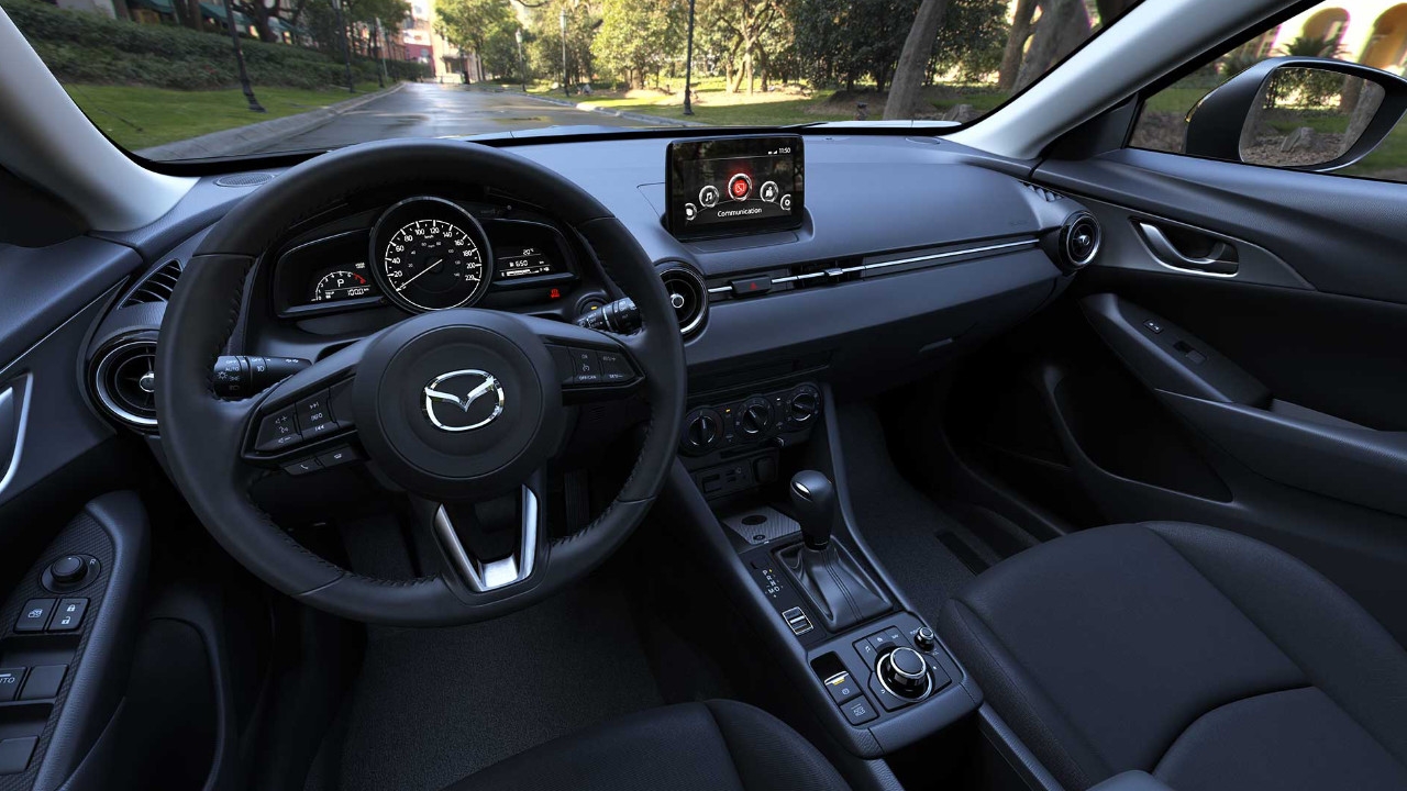 vue de l'habitacle et du tableau de bord d'une Mazda CX-3 2025