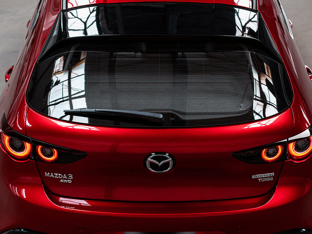 Vue de dos de la Mazda Mazda3 Sport 2024.